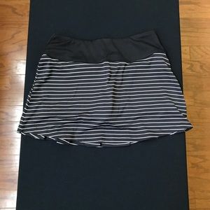 Black and white striped short skirt.